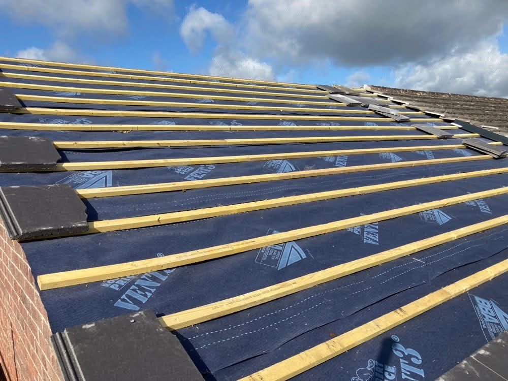 Blue breathable membrane and battens ready for slate roof covering
